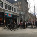 Bicycle rack in front of outdoor dining area in Downtown Minneapolis