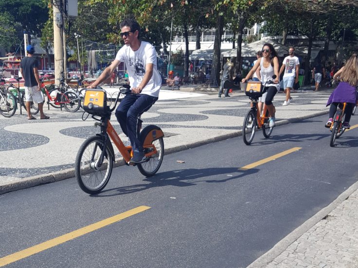 Man with sunglasses on bike path in Rio de Janeiro