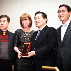 Representatives from Suwon, South Korea accept an Honorable Mention