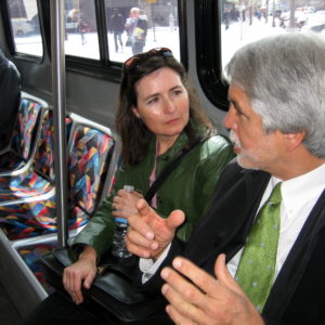 Audrey DeBarros and Enrique on a bus headed from Denver to Boulder