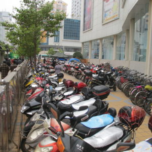 Motorbike and bicycle parking near mall_Kunming_March2011_MK
