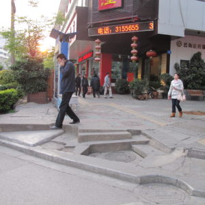 Uneven sidewalk corner_Kunming_March2011_MK